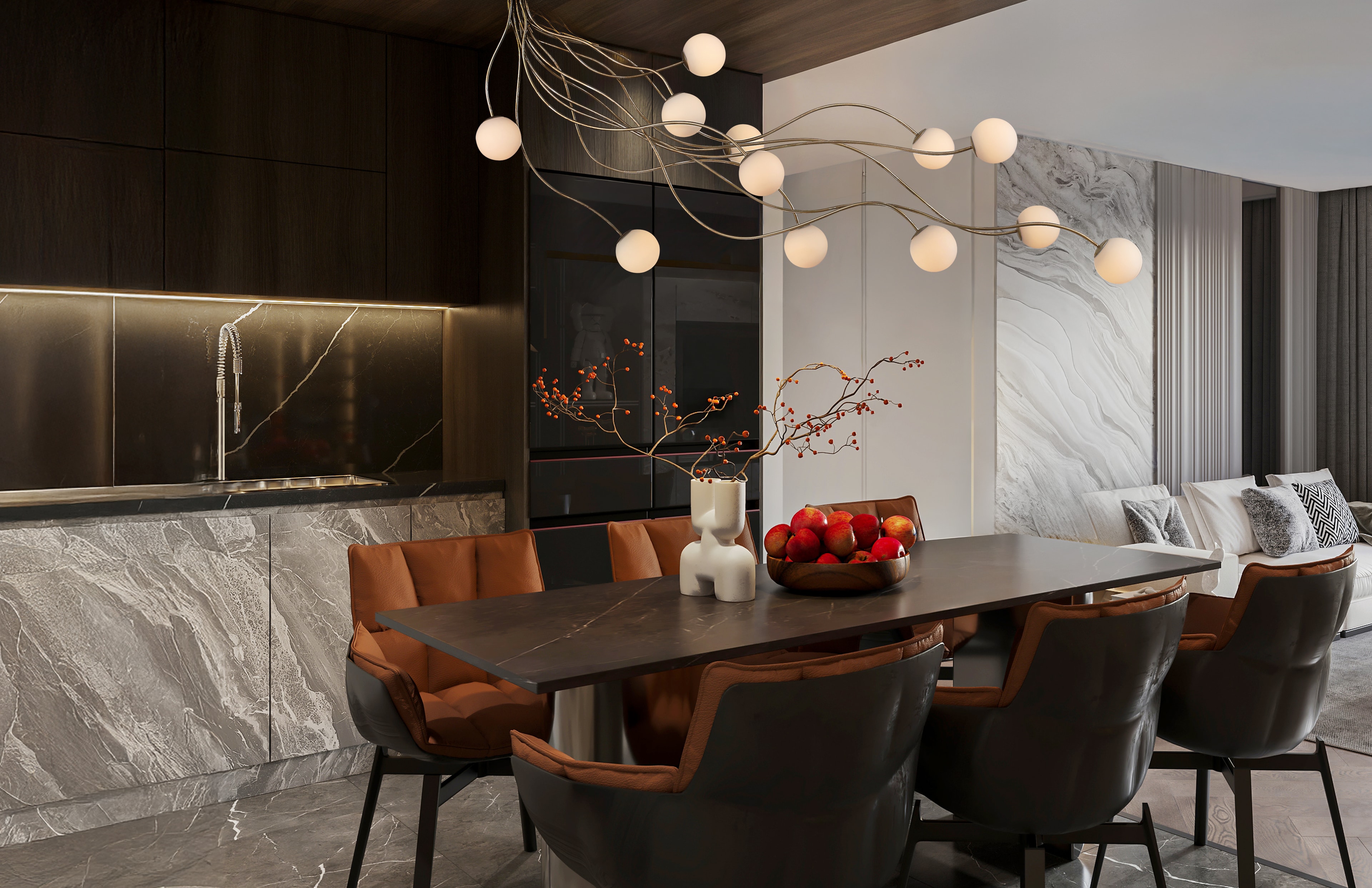 Modern dining space with marble accents and sculptural pendant lighting
