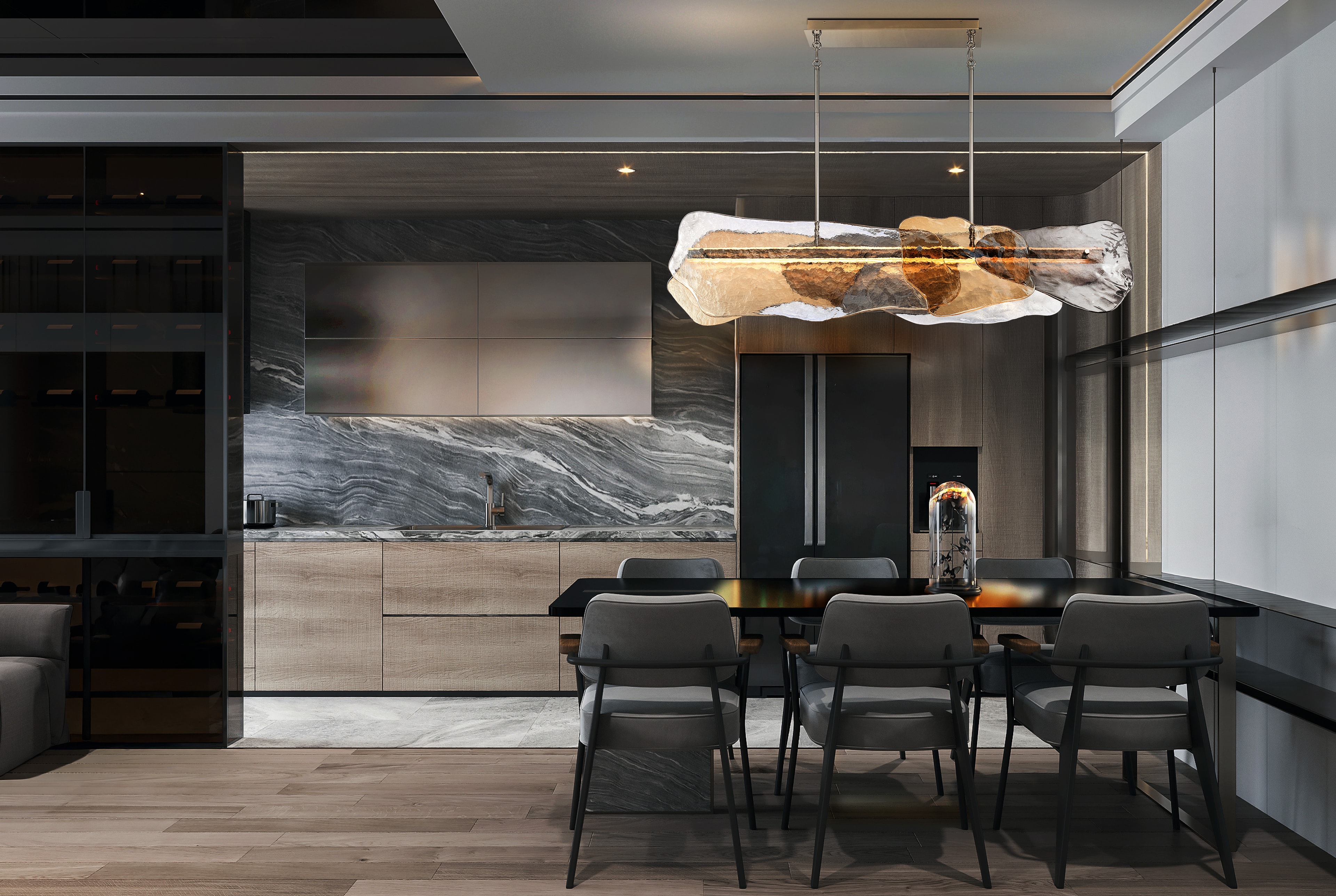 Modern kitchen and dining space with marble backsplash and statement pendant fixture